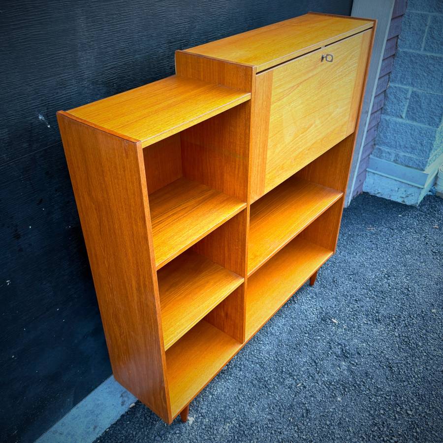 Danish mcm teak shelving unit with drop down bar. — photograph 4 of 6