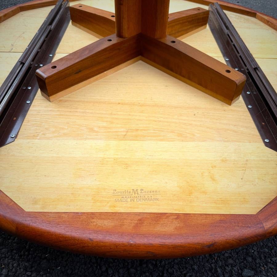 Vintage danish modern round teak pedestal table with extensions — photograph 10 of 10