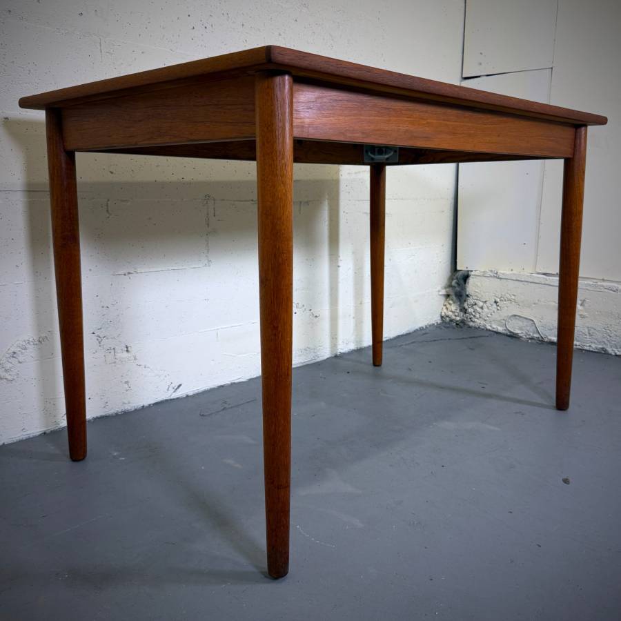Compact danish modern teak dining table — photograph 4 of 6