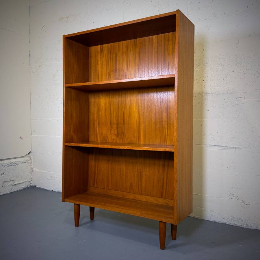 Compact mid century modern teak shelving unit — photograph 2 of 5