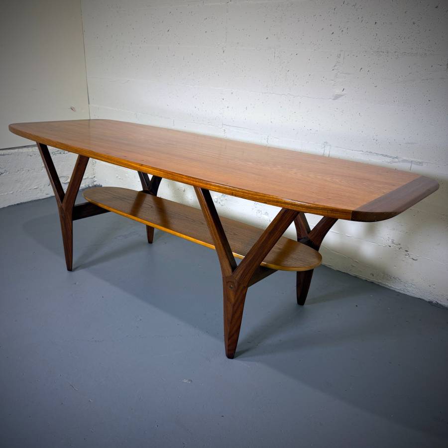 Gorgeous large sized mid century modern teak surfboard coffee table — photograph 2 of 8
