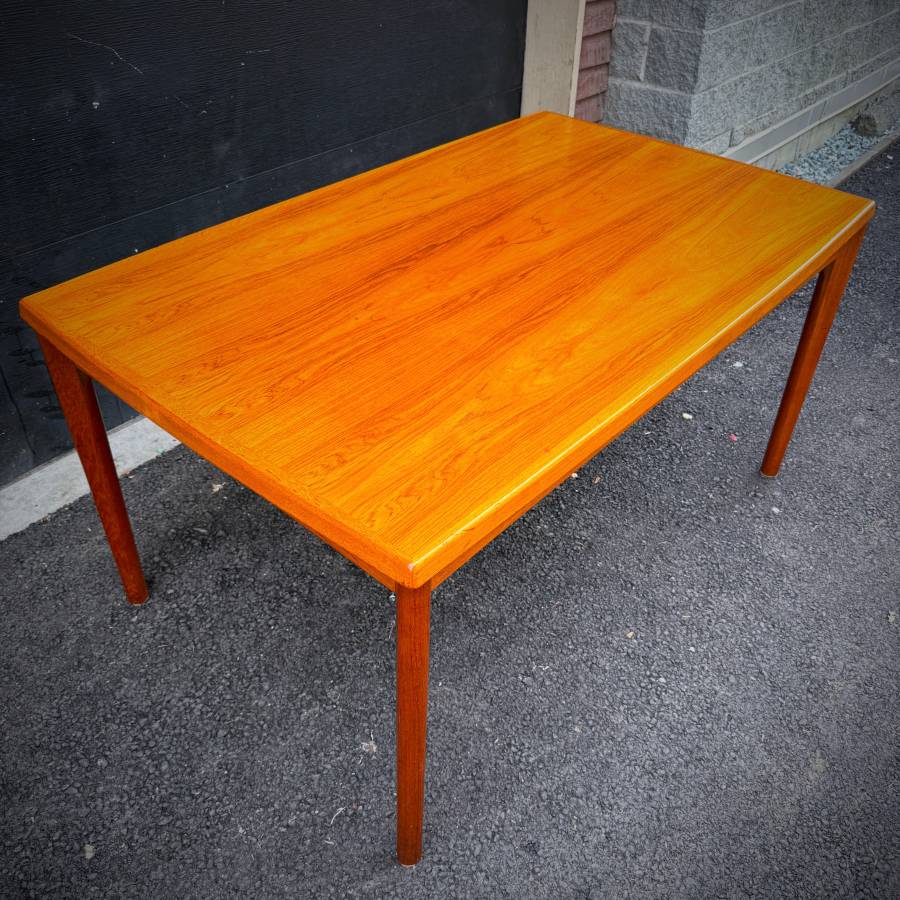 Danish modern vintage teak surfboard dining table with extensions — photograph 5 of 9