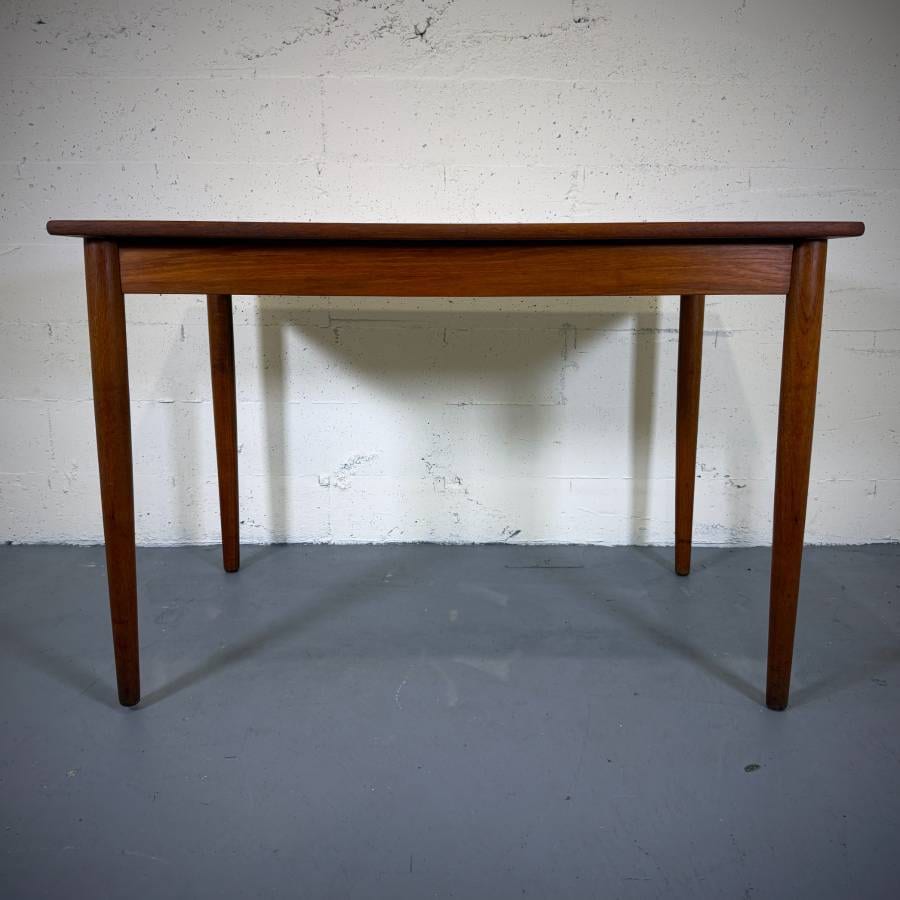 Compact danish modern teak dining table — photograph 2 of 6