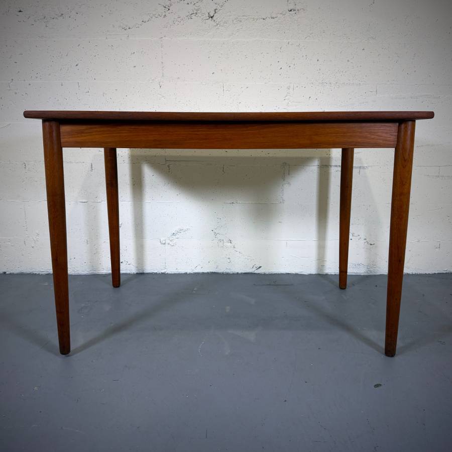 Compact danish modern teak dining table — photograph 2 of 6