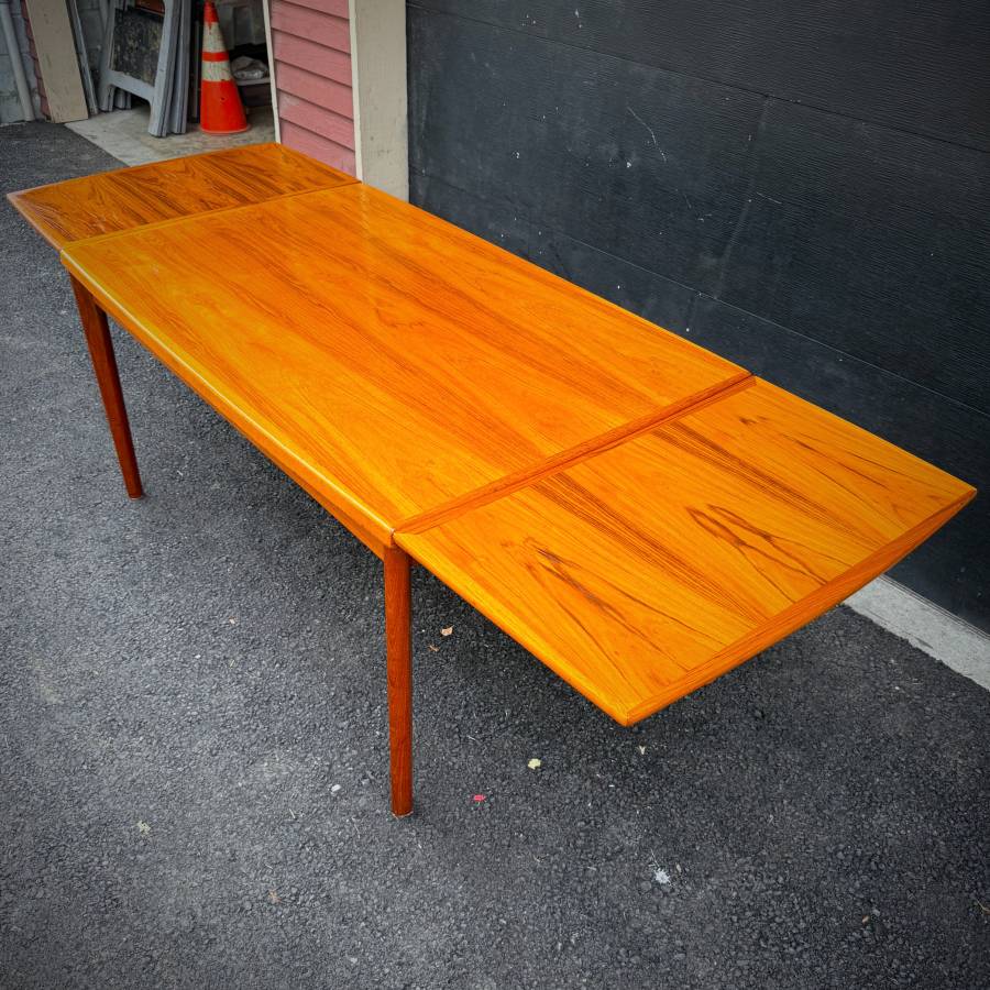 Danish modern vintage teak surfboard dining table with extensions — photograph 9 of 9