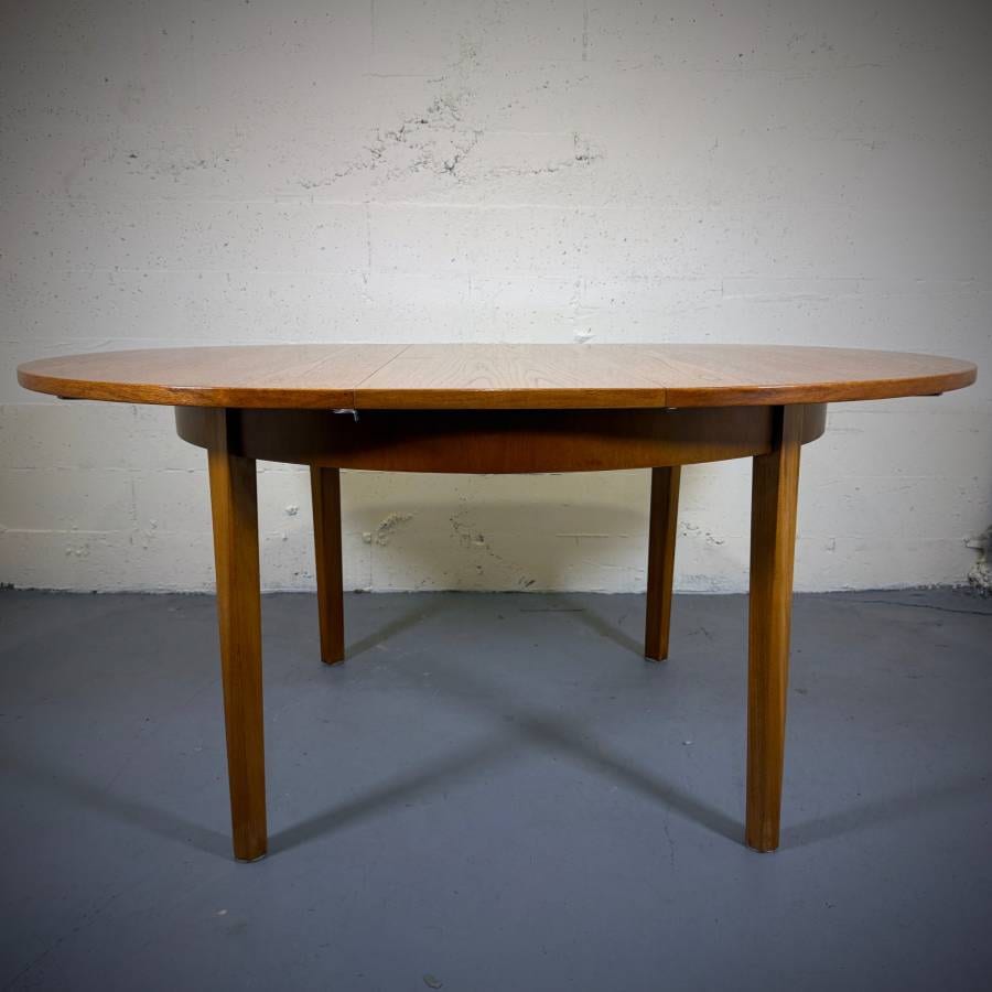 Mid century modern 1960s teak dining table from the UK — photograph 2 of 6