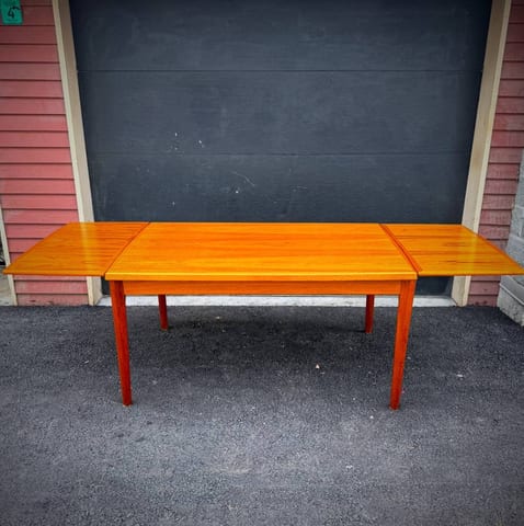 Danish modern vintage teak surfboard dining table with extensions