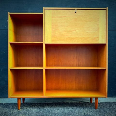 Danish mcm teak shelving unit with drop down bar.