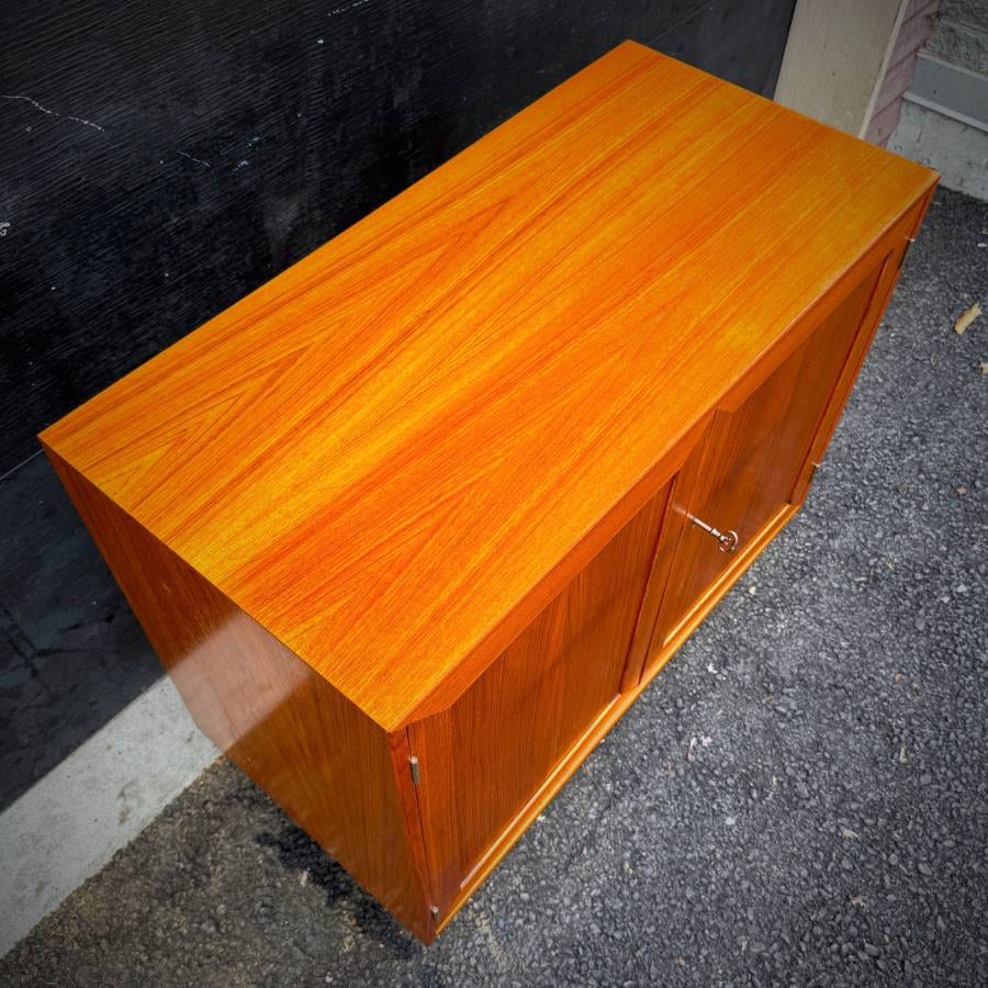 Mid century danish modern teak credenza with lock by Drylund — photograph 5 of 6