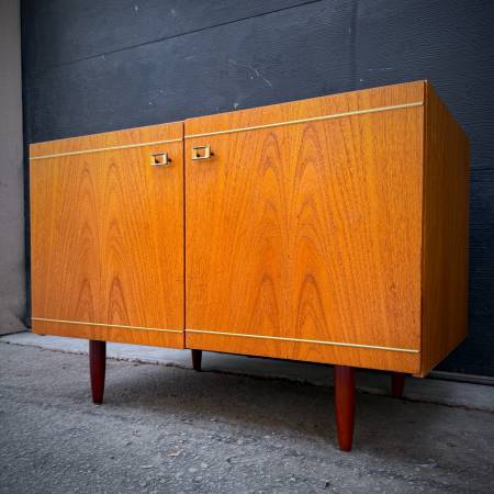 Danish modern teak compact credenza with gold accents