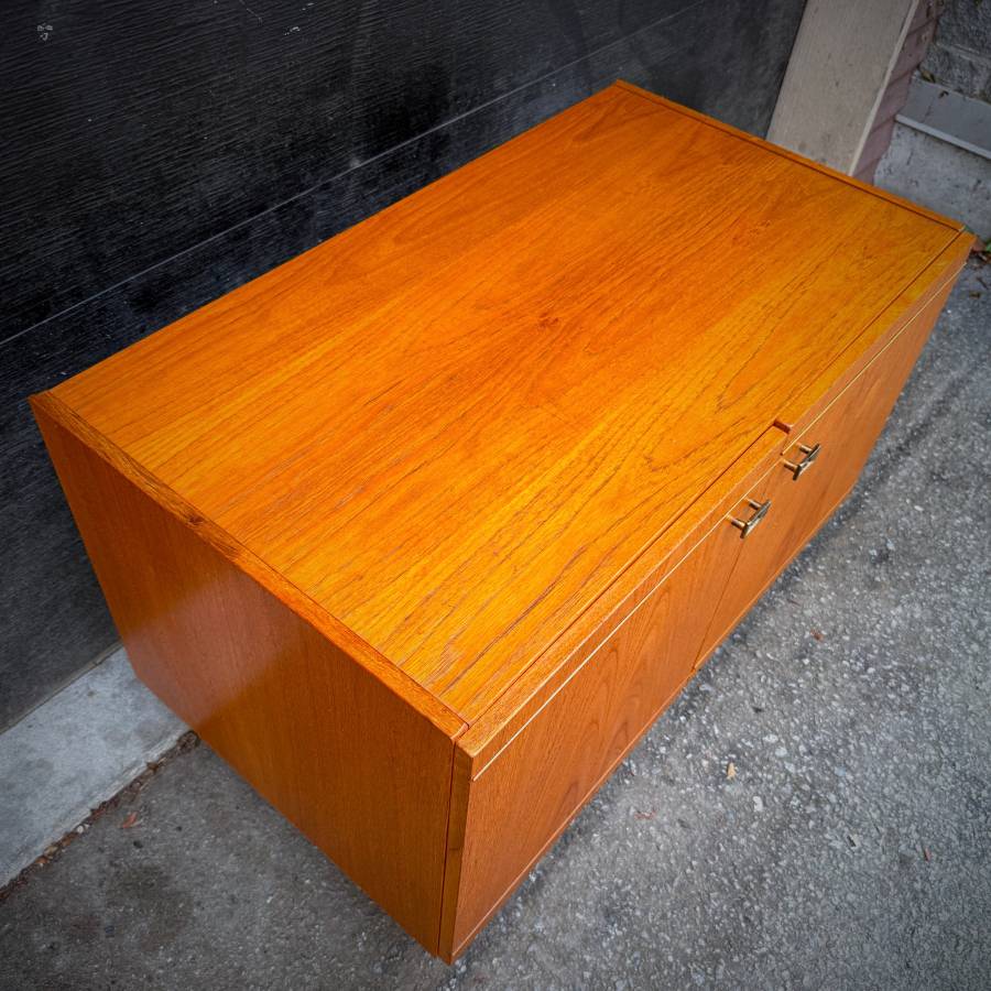Danish modern teak compact credenza with gold accents — photograph 6 of 6