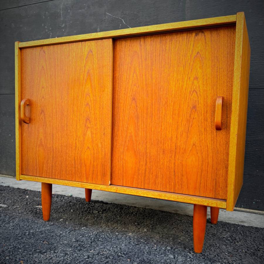 Compact mid century modern teak credenza made in Denmark — photograph 3 of 6