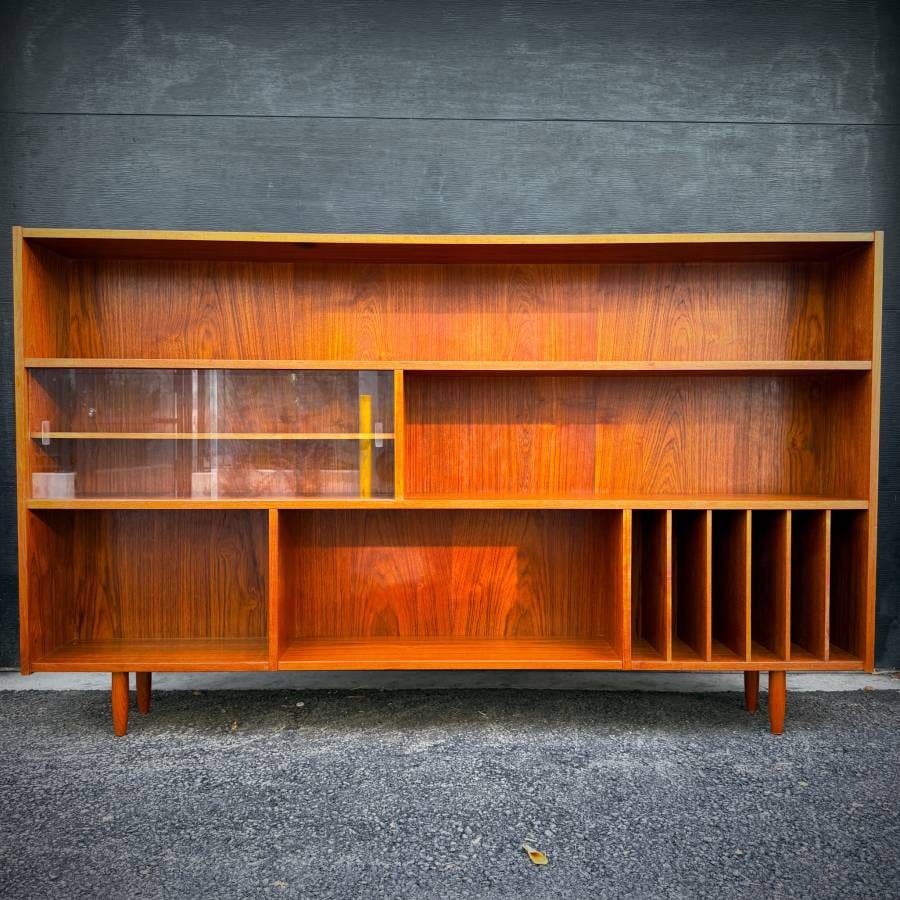 Beautiful extra long teak slim profile shelving unit made in Denmark — photograph 2 of 5