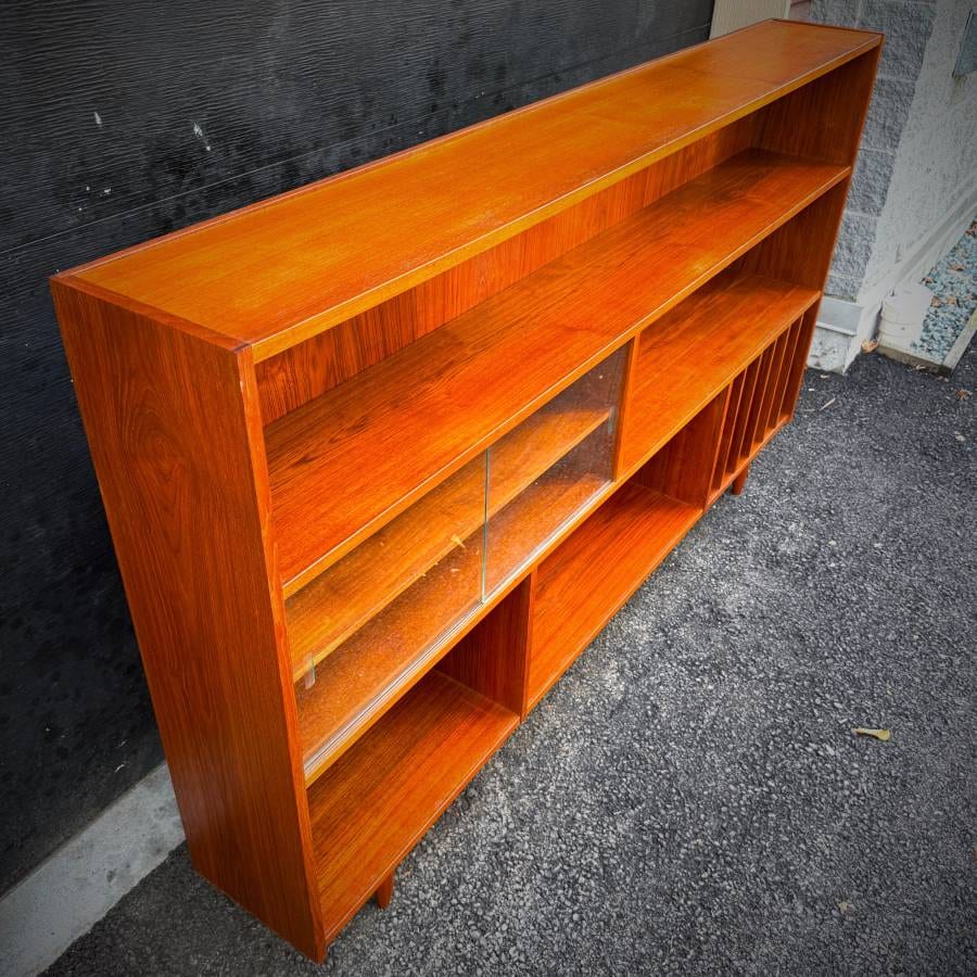 Beautiful extra long teak slim profile shelving unit made in Denmark — photograph 5 of 5