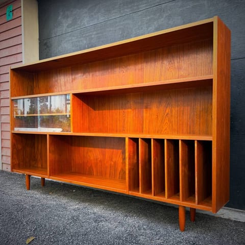 Beautiful extra long teak slim profile shelving unit made in Denmark