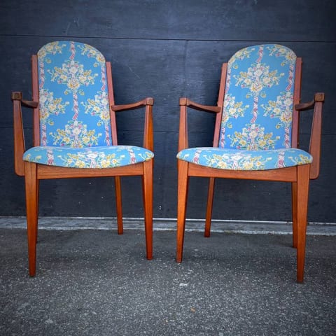 Pair of mid century modern teak arm chairs