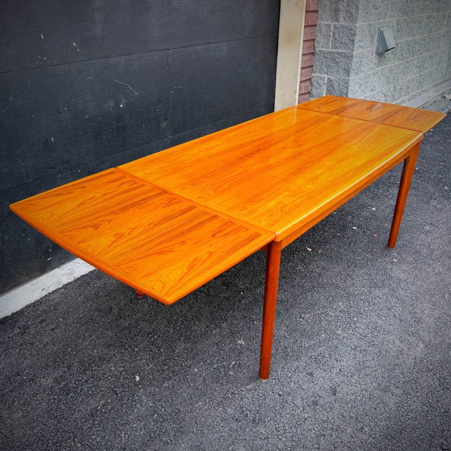 Danish modern vintage teak surfboard dining table with extensions — photograph 8 of 9